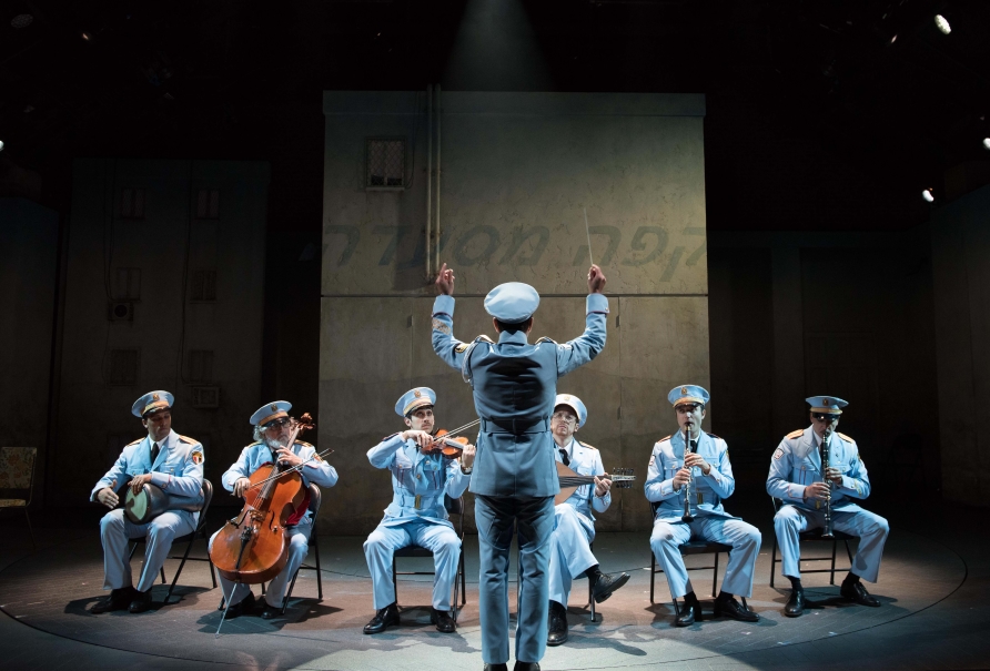 (l-r) Ari’el Stachel, David Garo Yellin, George Abud, Tony Shalhoub, Harvey Valdes, Sam Sadigursky, Alok Tewari in Atlantic Theater Company’s world premiere musical The Band’s Visit, directed by David Cromer, featuring a book by Itamar Moses and original score by David Yazbek. Opening December 8, 2016 at The Linda Gross Theater (336 West 20 Street). Photo: Ahron R. Foster.